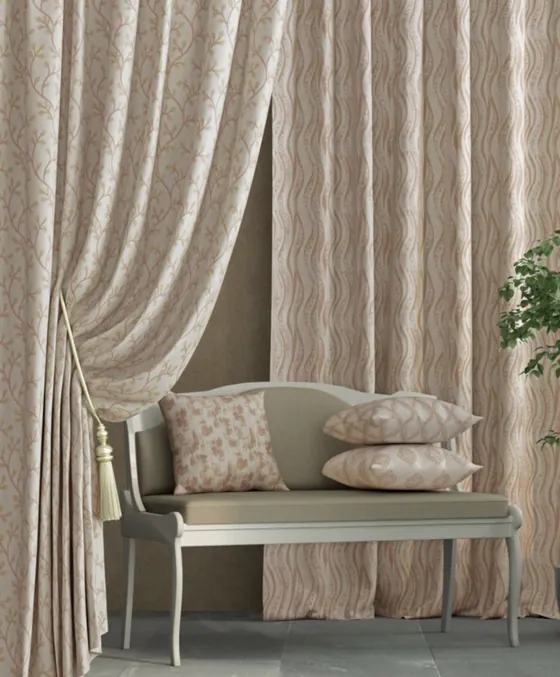 Soft floral curtains with a tassel tieback