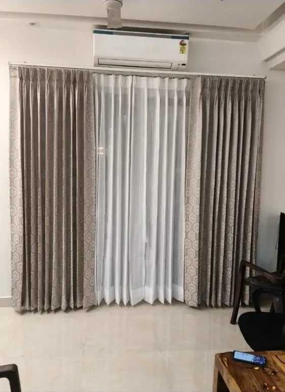 Double-layer curtains on a track