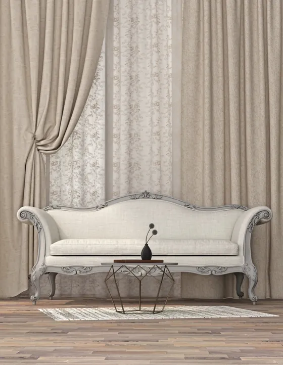 Layered linen drapes with an embroidered sheer