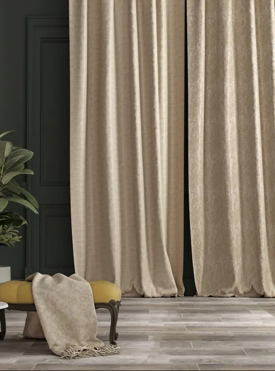 Beige linen curtain against a dark green wall