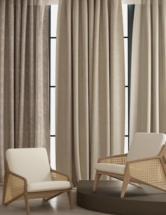 Embroidered sheer beside tan linen curtains