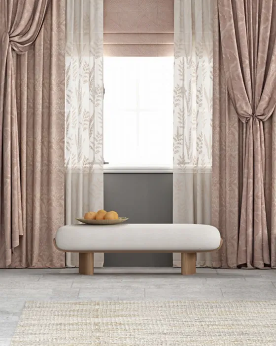 Rose-toned drapes with a fern sheer and a roman blind